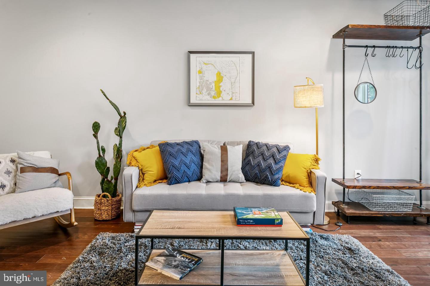 3019 Keswick Road Baltimore, MD 21211 - Photo 10 of 29 a living room with furniture and a table