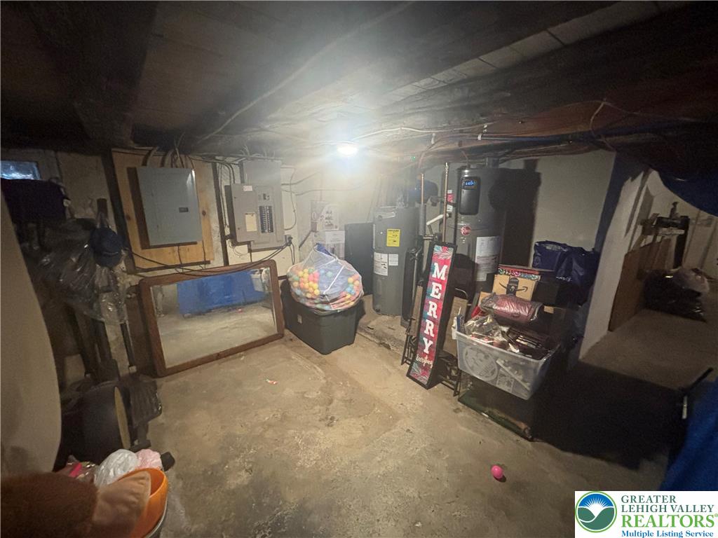 3404 North Ruch Street Whitehall, PA 18052 - Photo 28 of 36 A utilitarian basement area provides ample storage space and houses essential home systems.
