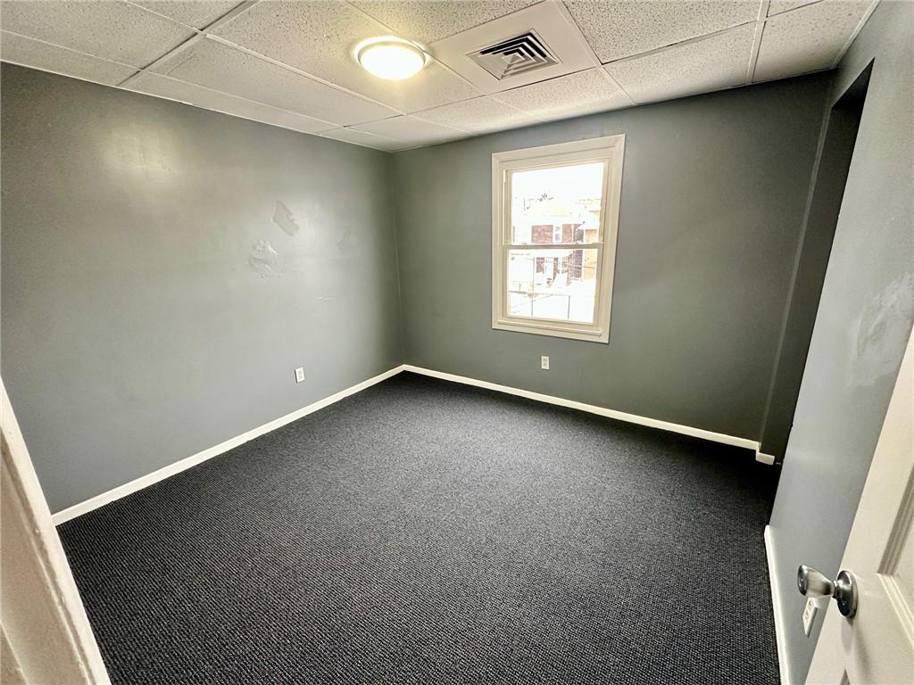 305 Bessemer Avenue, Unit 3B East Pittsburgh, PA 15112 - Photo 6 of 8 an empty room with a window