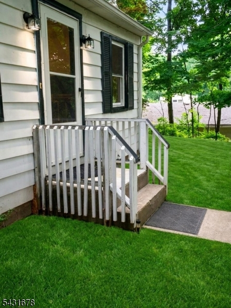 48 Vail Road Landing, NJ 07850 - Photo 3 of 23 a view of a house with backyard and porch