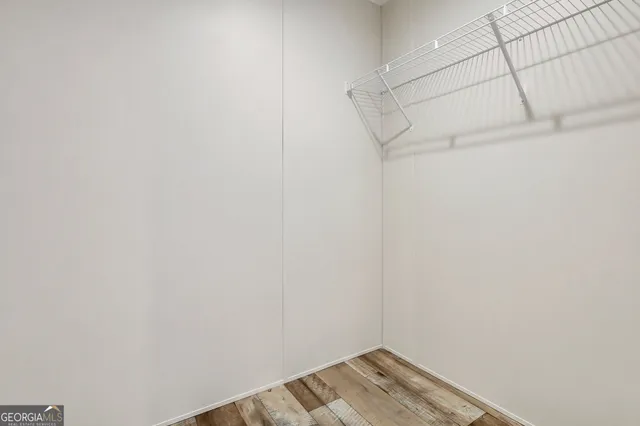 a view of a room with racks on the wall