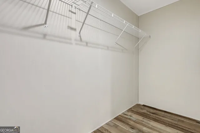 a view of a room with racks on the wall