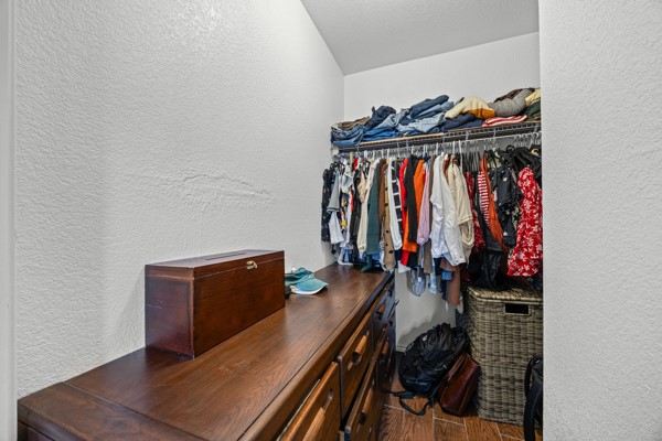 18400 Belfry Pass Manor, TX 78653 - Photo 14 of 22 a view of a walk in closet