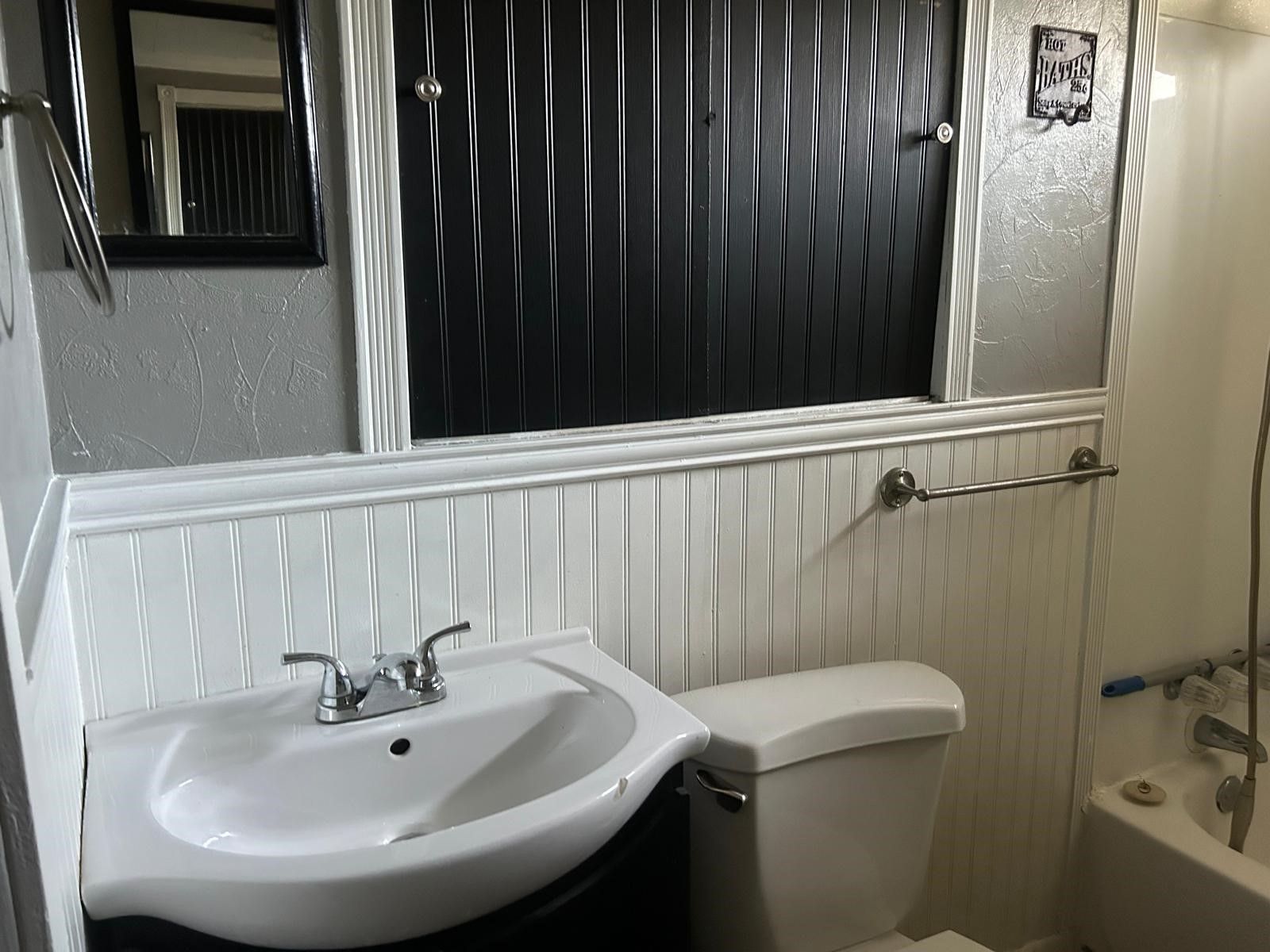 401 Billington Street Clute, TX 77531 - Photo 13 of 22 a bathroom with a sink and a toilet