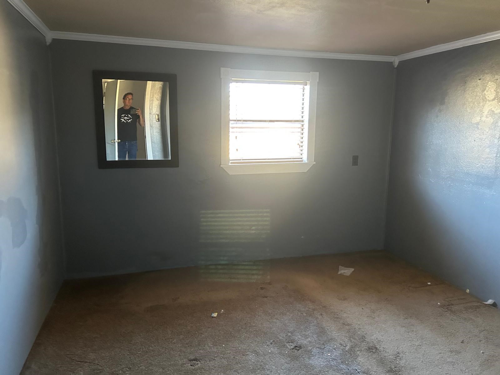 401 Billington Street Clute, TX 77531 - Photo 10 of 22 an empty room with a window