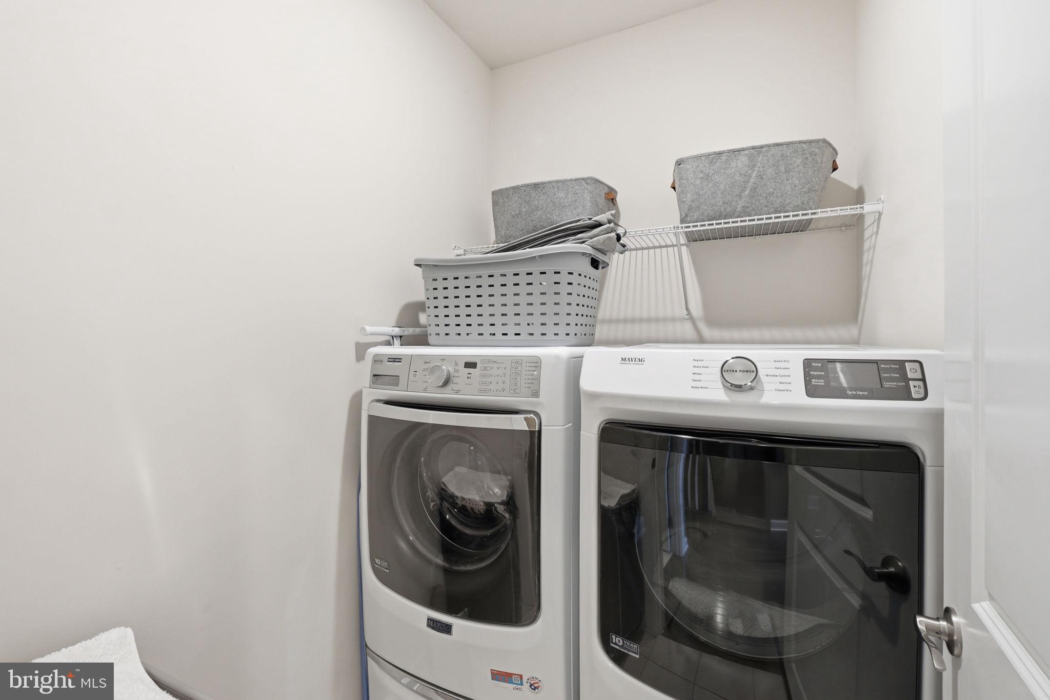 17812 Thomas Village Lane Sandy Spring, MD 20860 - Photo 27 of 37 a utility room with dryer and washer
