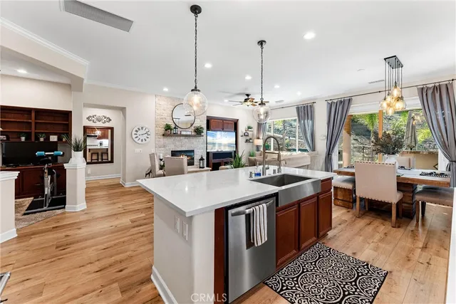 a large kitchen with stainless steel appliances kitchen island a large island in the center