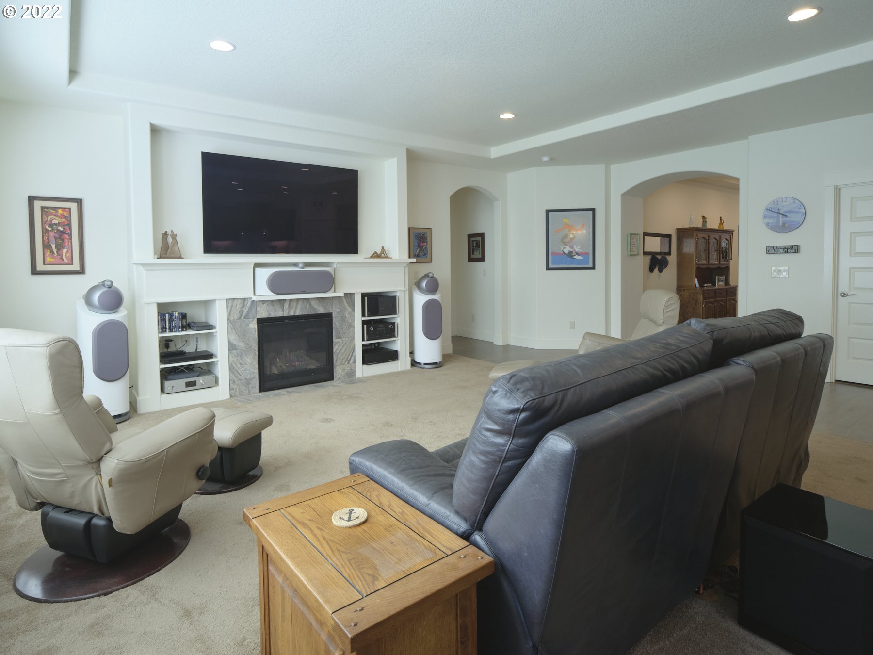 4911 South 19th Street Ridgefield, WA 98642 - Photo 14 of 26 a living room with furniture and a flat screen tv