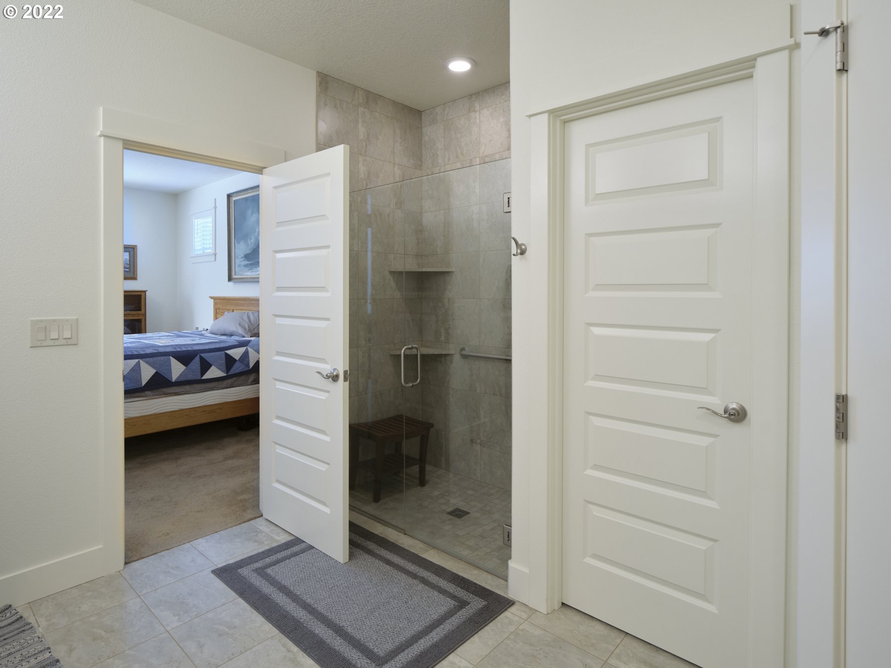 4911 South 19th Street Ridgefield, WA 98642 - Photo 21 of 26 a bathroom with a shower and a sink