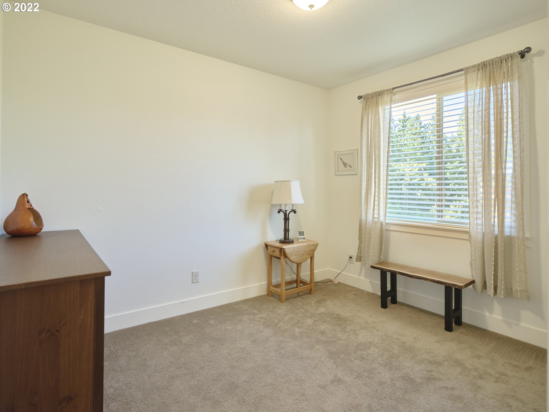 4911 South 19th Street Ridgefield, WA 98642 - Photo 23 of 26 a living room with furniture and a window