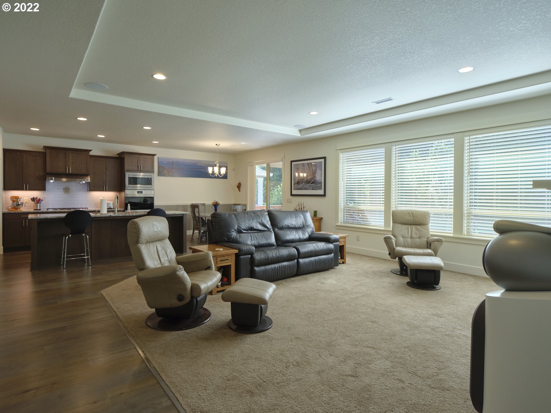4911 South 19th Street Ridgefield, WA 98642 - Photo 7 of 26 a living room with furniture and a large window