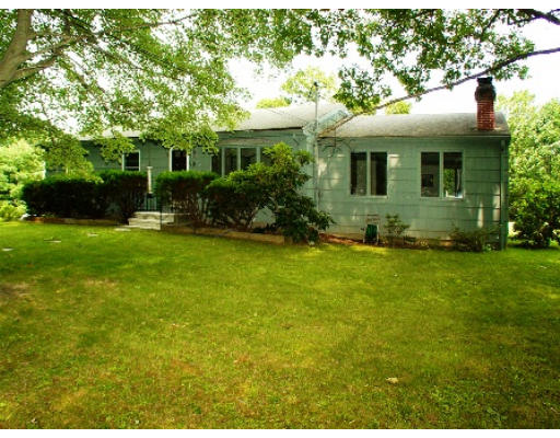 14 Middle Road Amesbury, MA 01913 - Photo 1 of 10 front view of a house with a yard