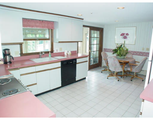 14 Middle Road Amesbury, MA 01913 - Photo 3 of 10 a kitchen with a sink cabinets and wooden floor