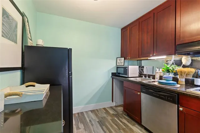 a view of fountain with a yard