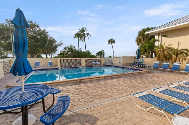 a outdoor living space with furniture and city view