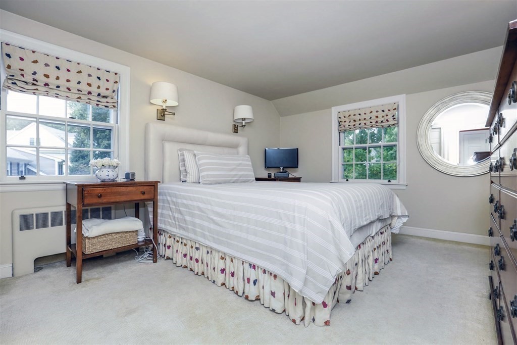 20 Chesterton Road Wellesley, MA 02481 - Photo 20 of 31 a bedroom with bed and a large window