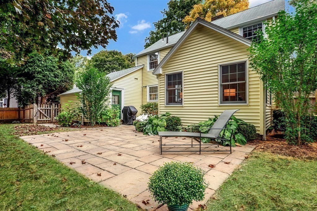 20 Chesterton Road Wellesley, MA 02481 - Photo 29 of 31 a house with a yard and a large tree
