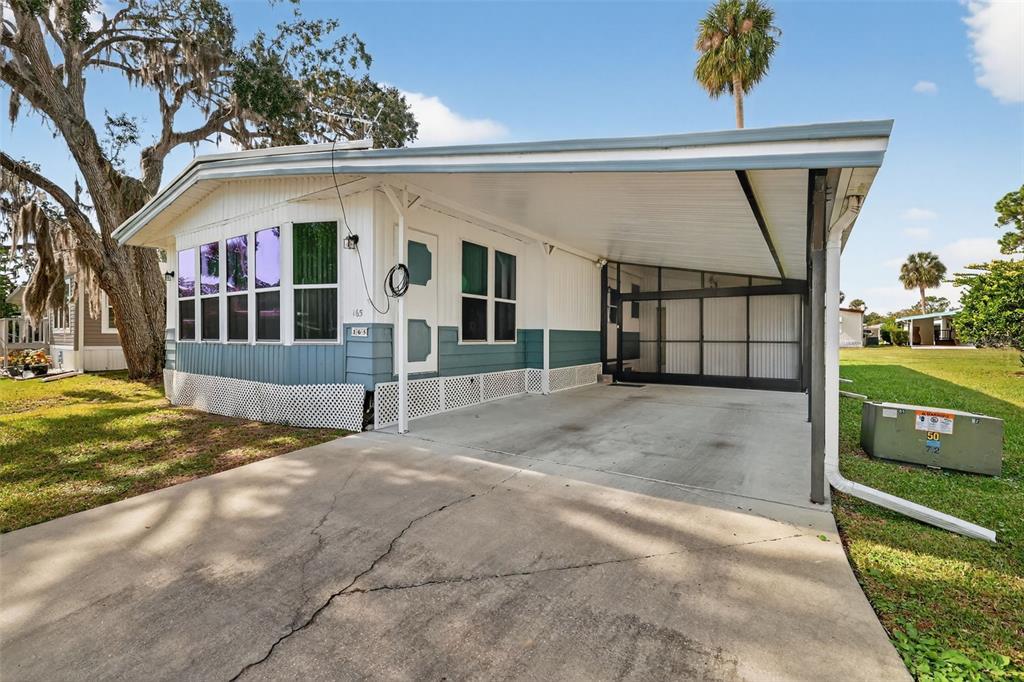 165 Shady Lane Eustis, FL 32726 - Photo 2 of 25 a view of a house with a garden