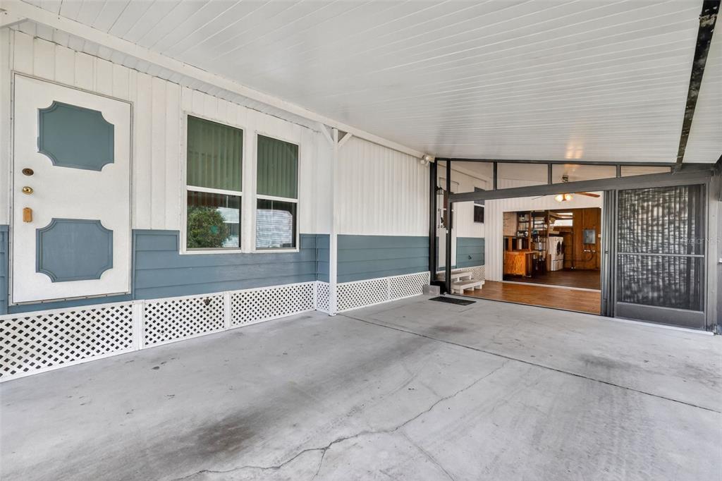 165 Shady Lane Eustis, FL 32726 - Photo 3 of 25 a view of a room with wooden floor and windows