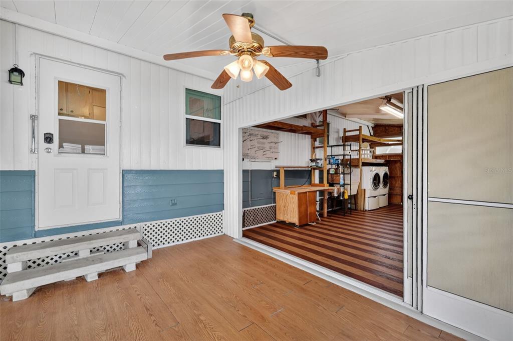 165 Shady Lane Eustis, FL 32726 - Photo 4 of 25 a bedroom with furniture and wooden floor