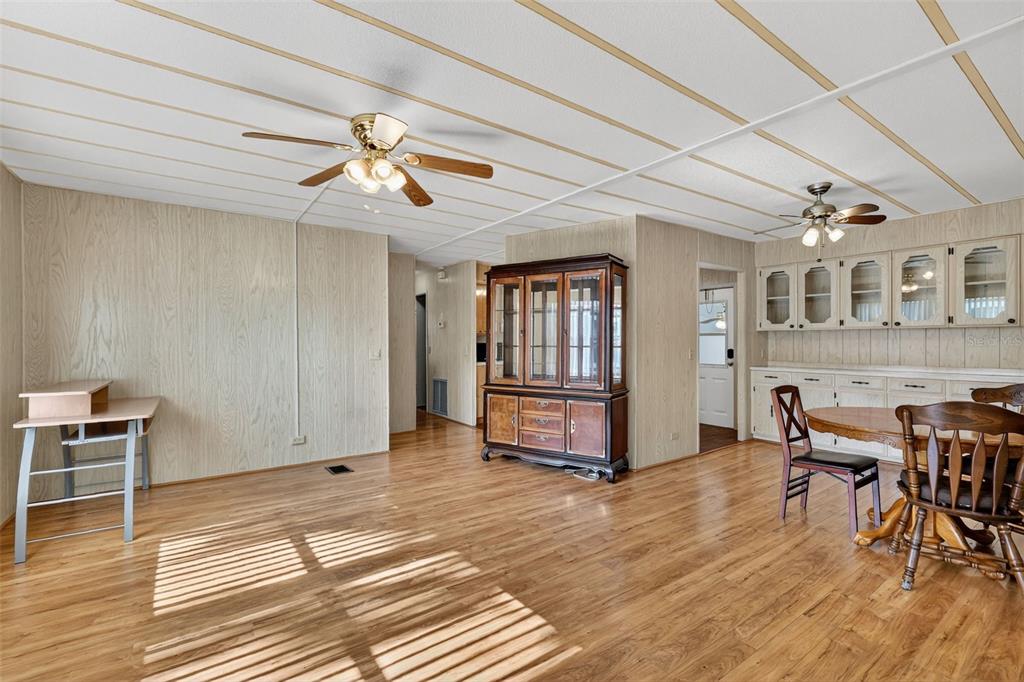 165 Shady Lane Eustis, FL 32726 - Photo 7 of 25 a view of a livingroom with furniture and workspace