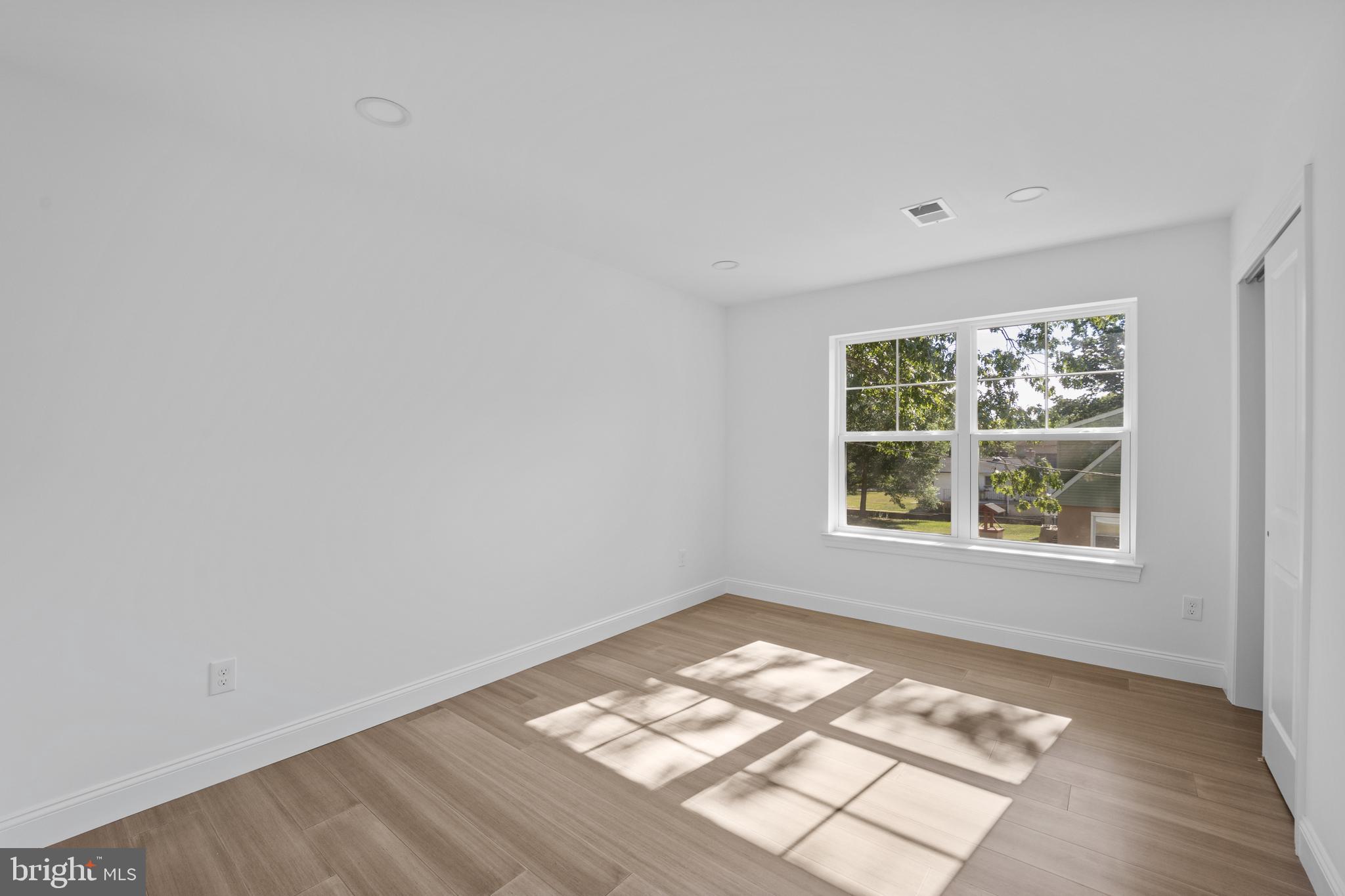492 Ellis Avenue Lawnside, NJ 08045 - Photo 24 of 33 an empty room with a window