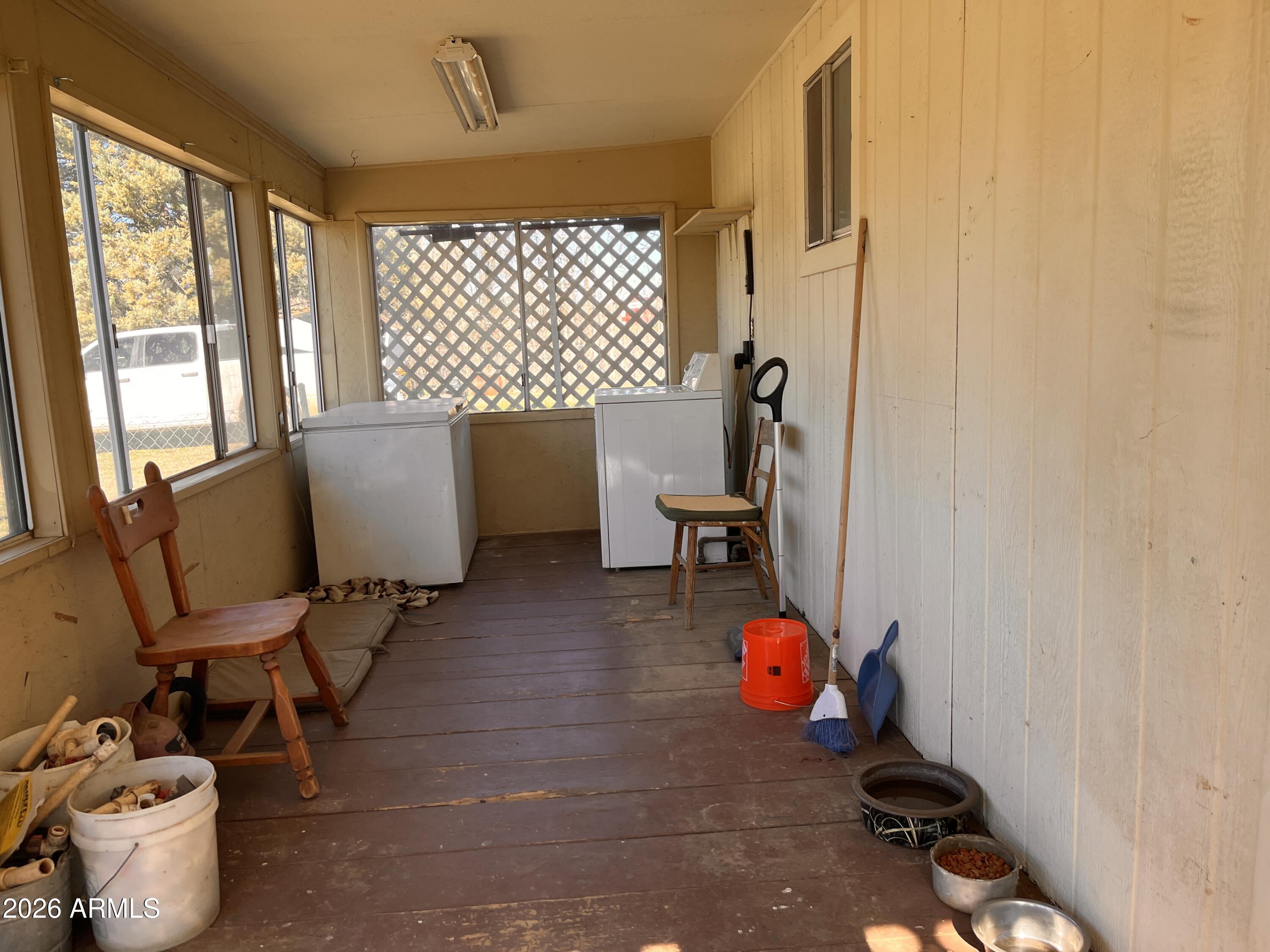 3140 Iron Springs Road Skull Valley, AZ 86338 - Photo 12 of 37 a view of a room with gym equipment