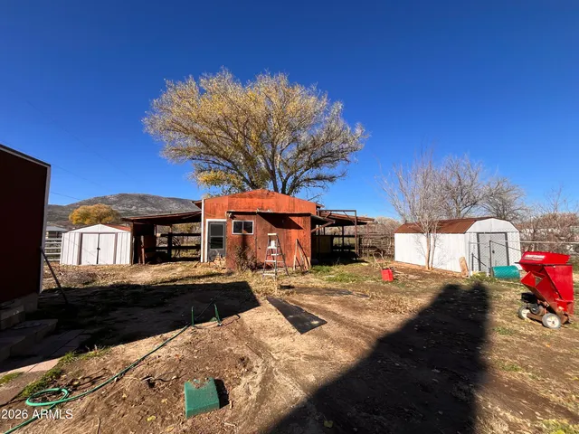 a view of a storage room with wooden walls