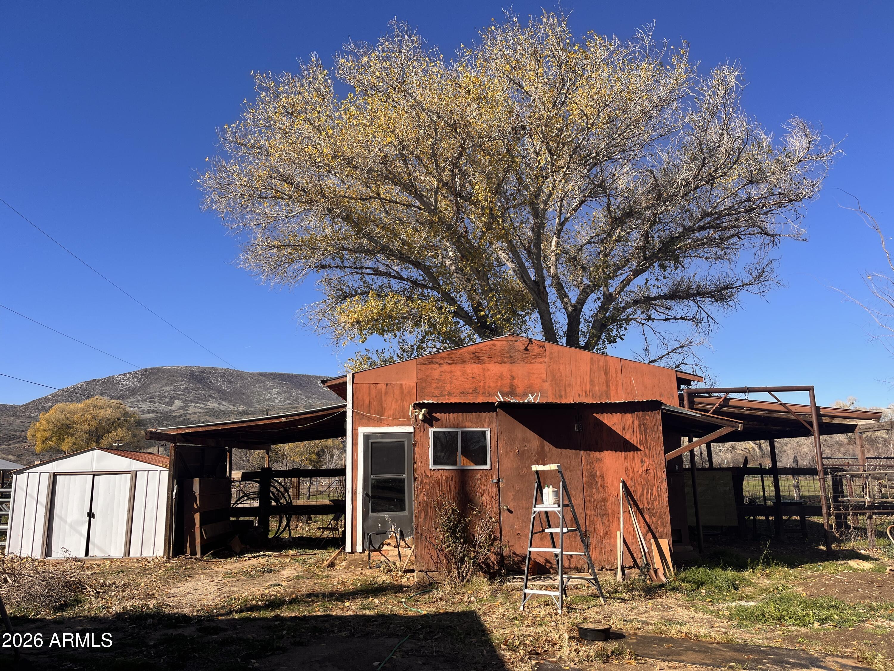 3140 Iron Springs Road Skull Valley, AZ 86338 - Photo 21 of 37 a front view of a house