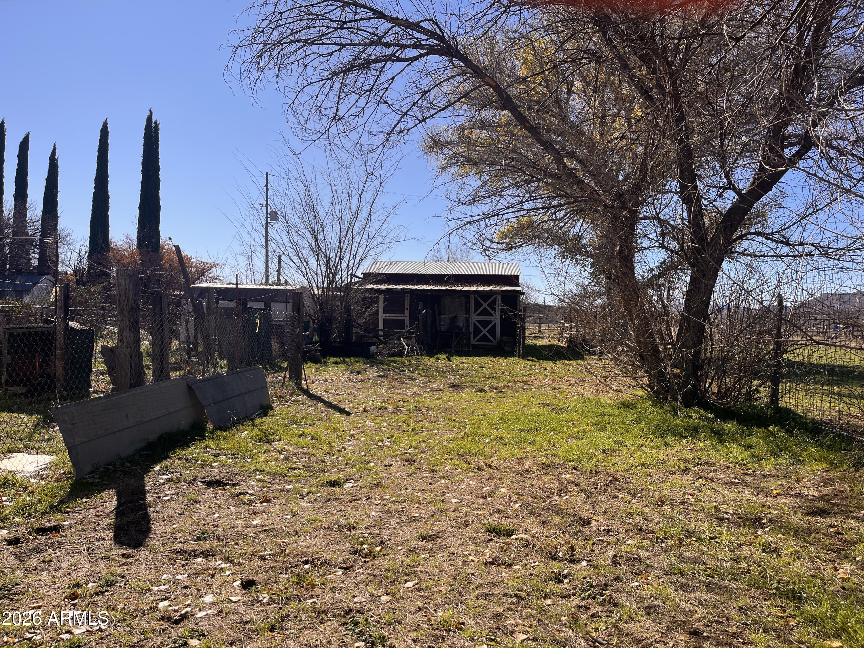 3140 Iron Springs Road Skull Valley, AZ 86338 - Photo 29 of 37 a view of a house with backyard and sitting area