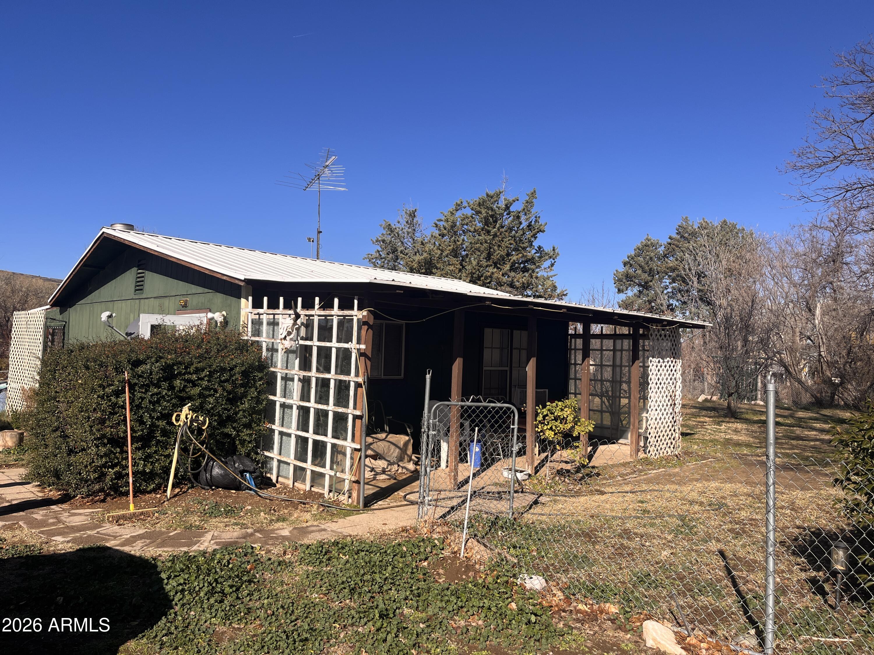 3140 Iron Springs Road Skull Valley, AZ 86338 - Photo 4 of 37 a view of a house with backyard