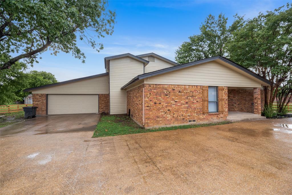 2720 Seeton Road Grand Prairie, TX 75054 - Photo 2 of 31 front view of a house with a street