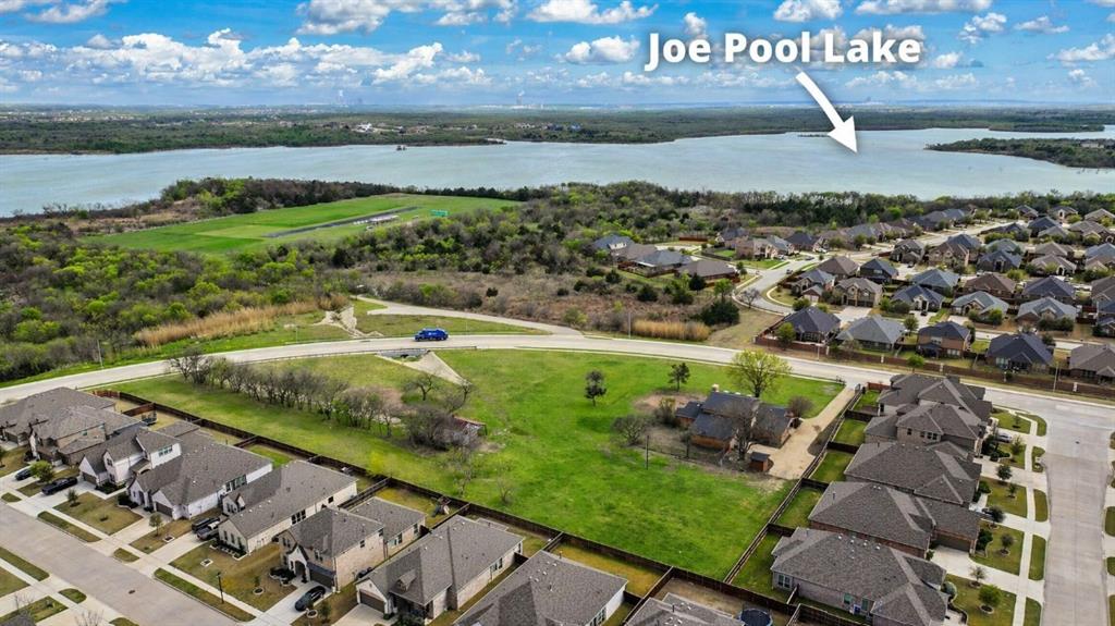 2720 Seeton Road Grand Prairie, TX 75054 - Photo 3 of 31 a view of a lake with a city view