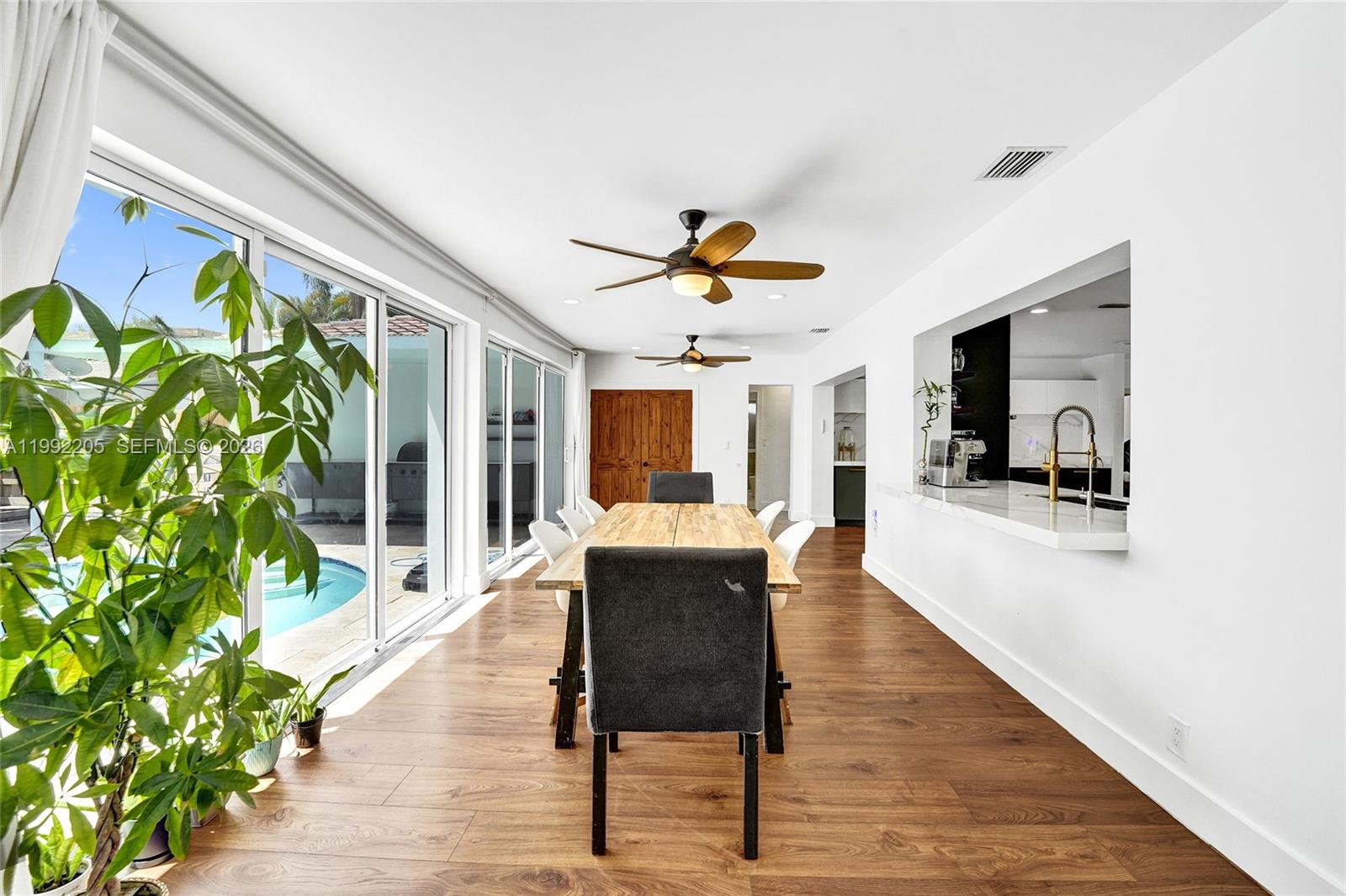 3350 North 40th Street Hollywood, FL 33021 - Photo 33 of 100 a living room with furniture and a large window