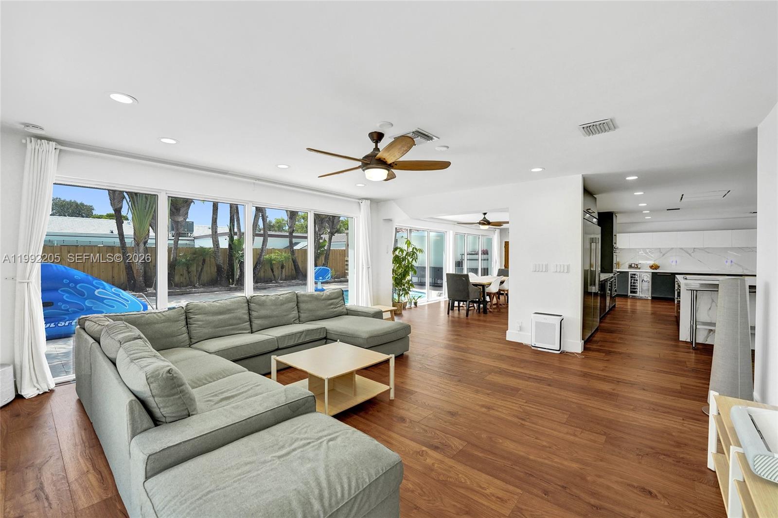 3350 North 40th Street Hollywood, FL 33021 - Photo 39 of 100 a living room with furniture and a large window