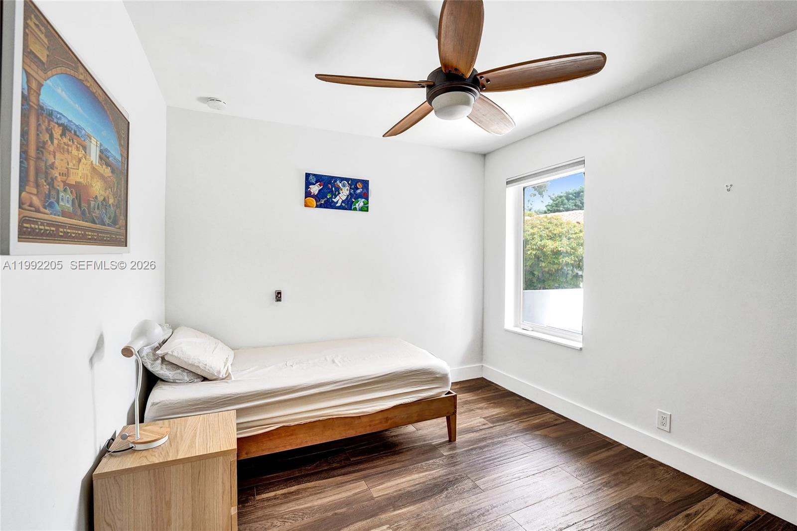 3350 North 40th Street Hollywood, FL 33021 - Photo 65 of 100 a bedroom with a bed and a window