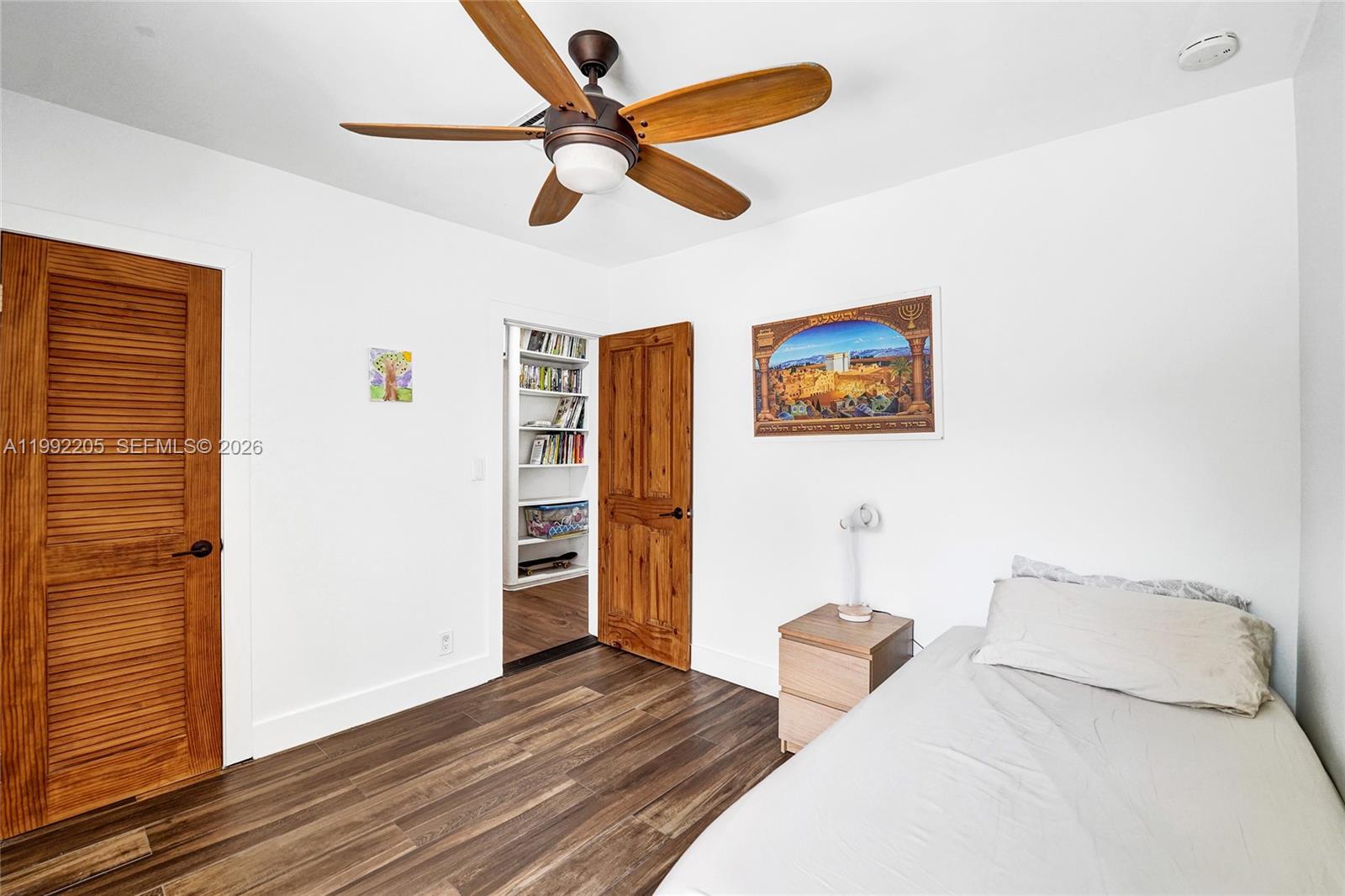 3350 North 40th Street Hollywood, FL 33021 - Photo 67 of 100 a bedroom with a bed and a table
