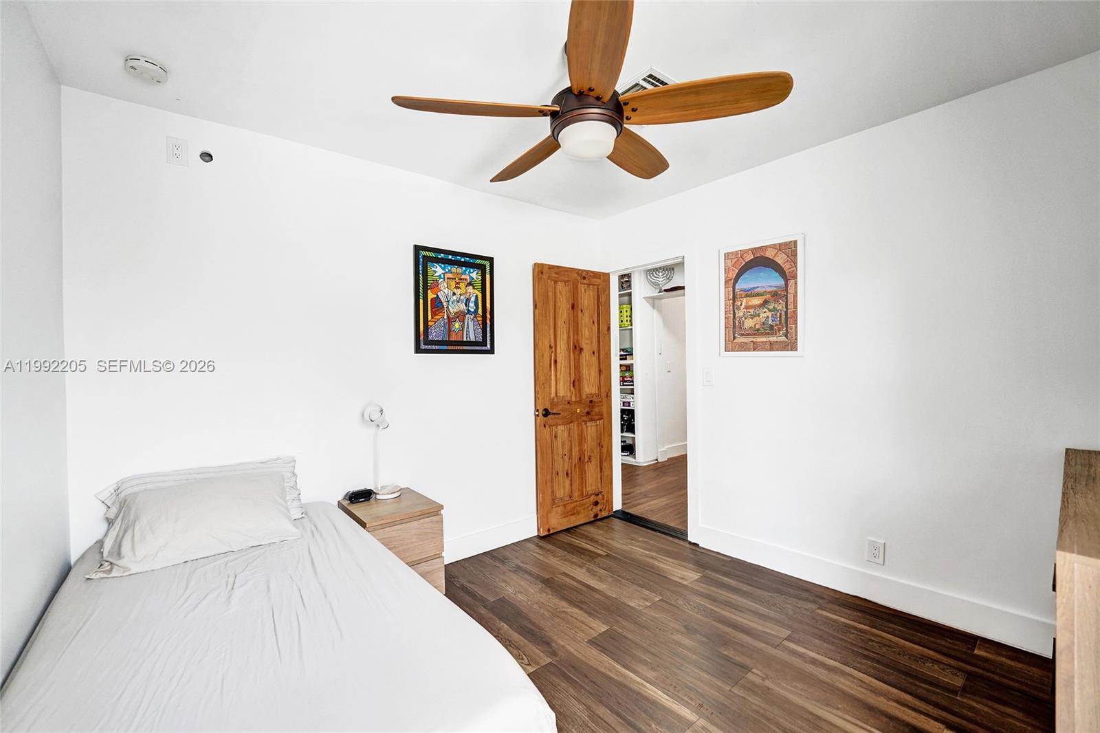 3350 North 40th Street Hollywood, FL 33021 - Photo 69 of 100 a bedroom with a bed and a dresser