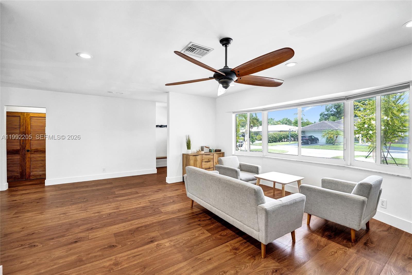 3350 North 40th Street Hollywood, FL 33021 - Photo 74 of 100 a living room with furniture and a window