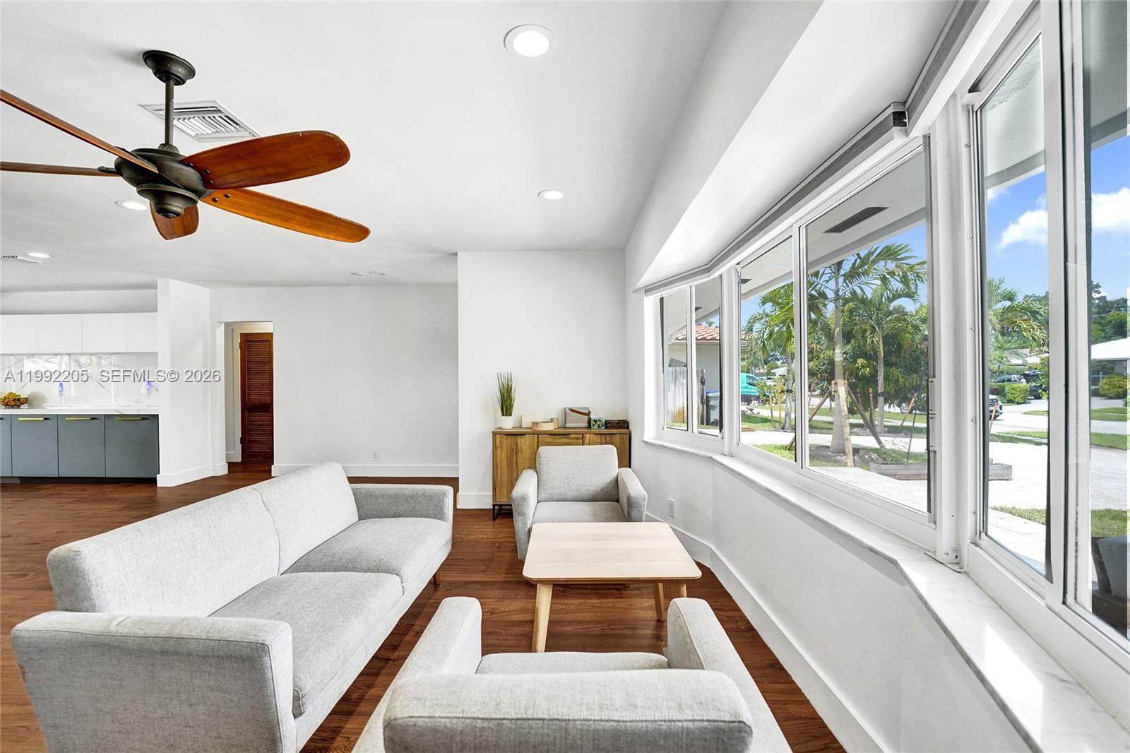 3350 North 40th Street Hollywood, FL 33021 - Photo 75 of 100 a living room with furniture and a large window