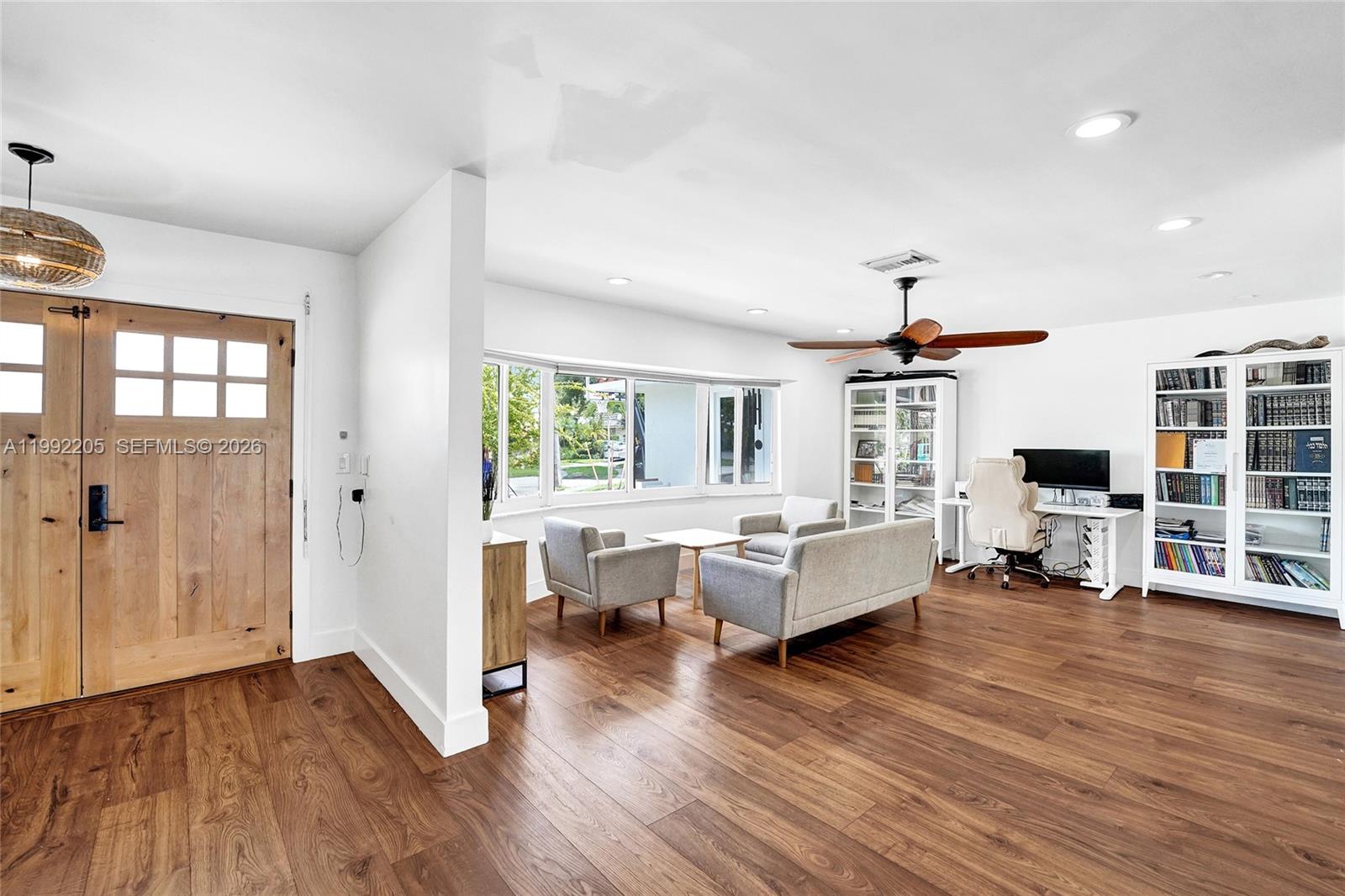 3350 North 40th Street Hollywood, FL 33021 - Photo 77 of 100 a living room with furniture and wooden floor