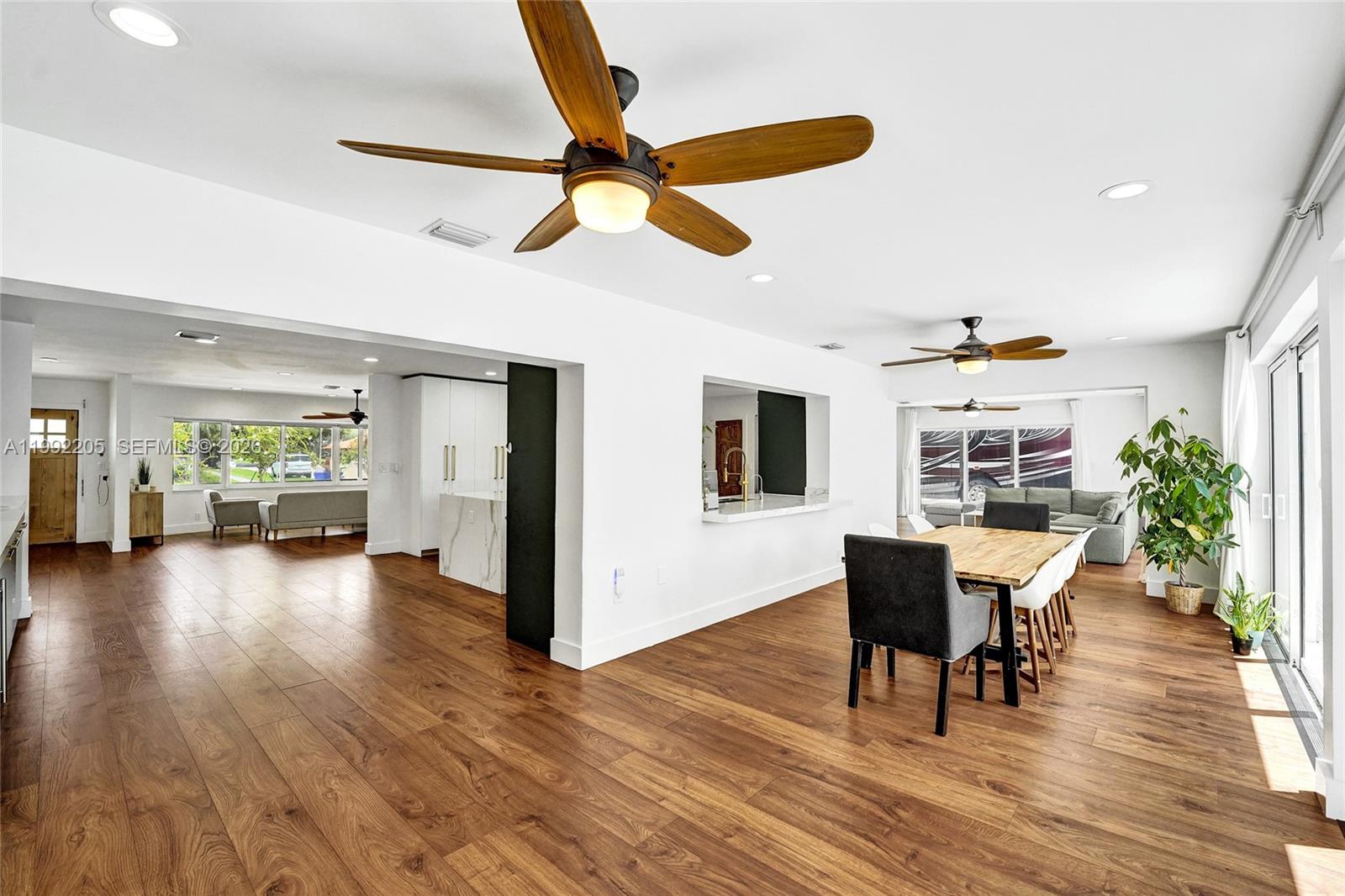 3350 North 40th Street Hollywood, FL 33021 - Photo 83 of 100 a view of a livingroom with furniture and a ceiling fan