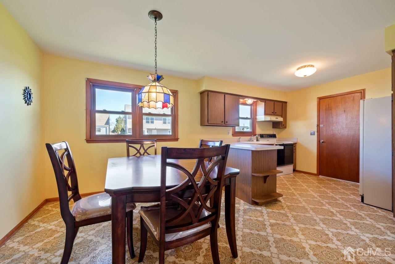 300 Main Street Middlesex, NJ 08846 - Photo 5 of 17 a view of a dining room with furniture