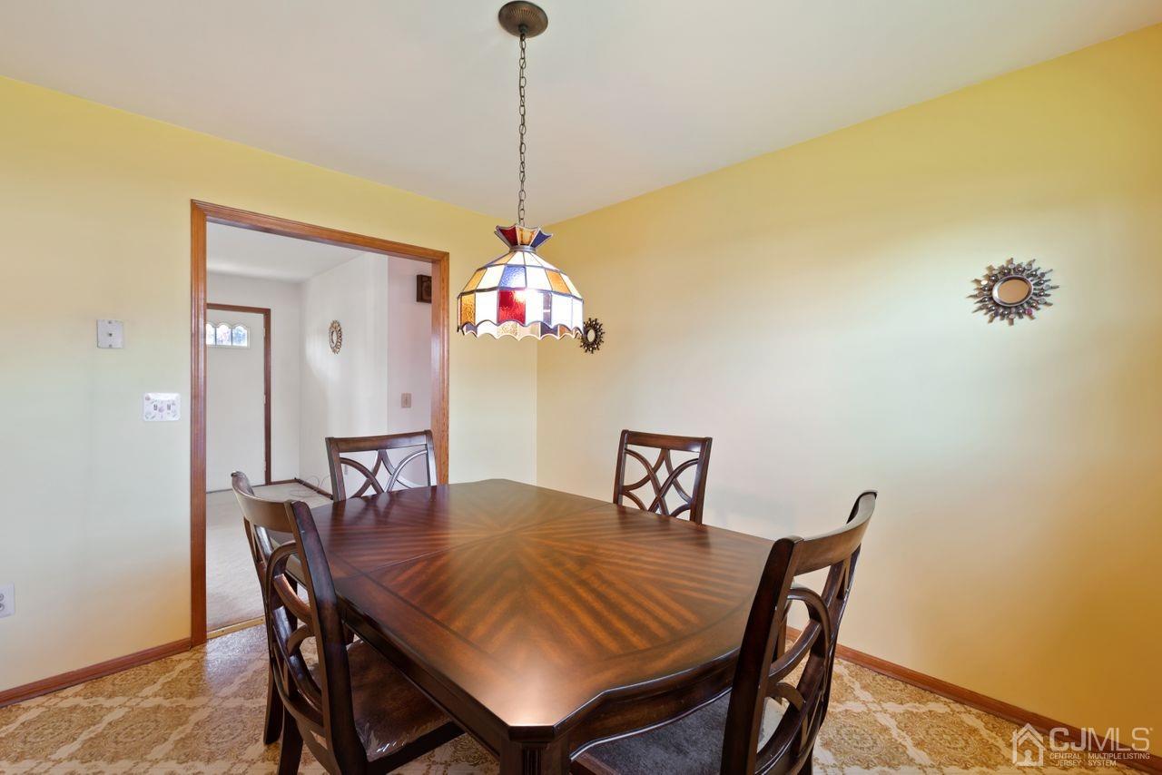 300 Main Street Middlesex, NJ 08846 - Photo 7 of 17 a view of a dining room with a table and chairs