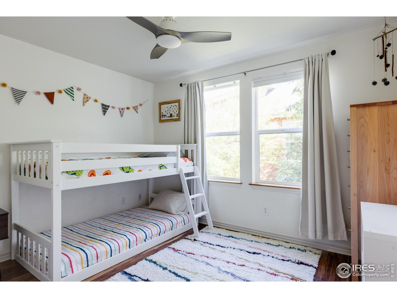 3739 Ridgeway Street Boulder, CO 80301 - Photo 11 of 16 a bedroom with a bed and a window