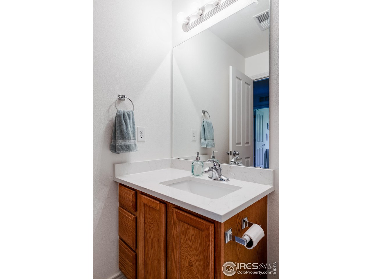 3739 Ridgeway Street Boulder, CO 80301 - Photo 13 of 16 a bathroom with a sink and a mirror