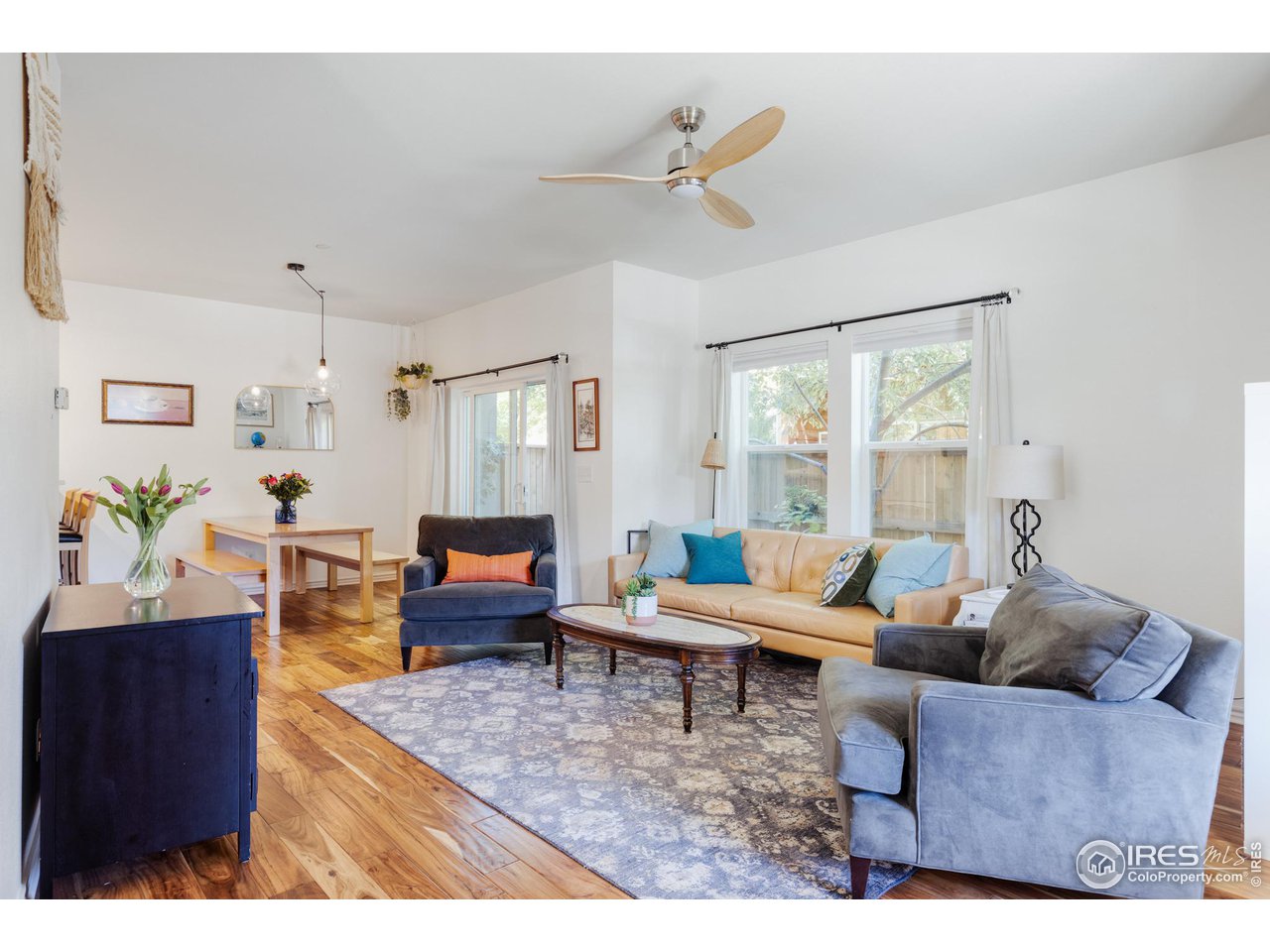 3739 Ridgeway Street Boulder, CO 80301 - Photo 3 of 16 a living room with furniture and a wooden floor