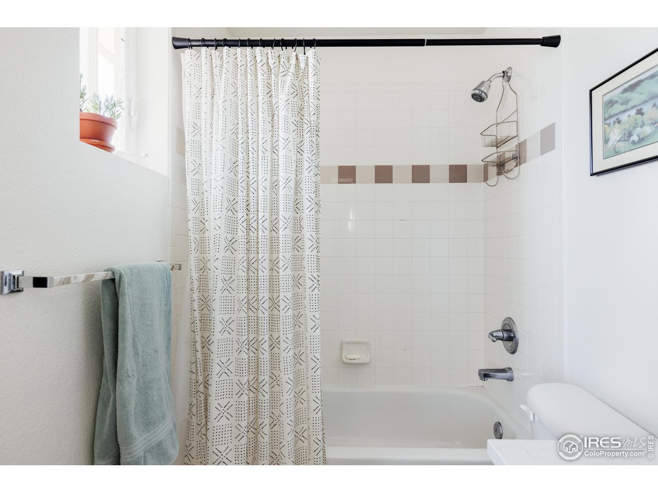 3739 Ridgeway Street Boulder, CO 80301 - Photo 9 of 16 a bathroom with a shower and a bath tub