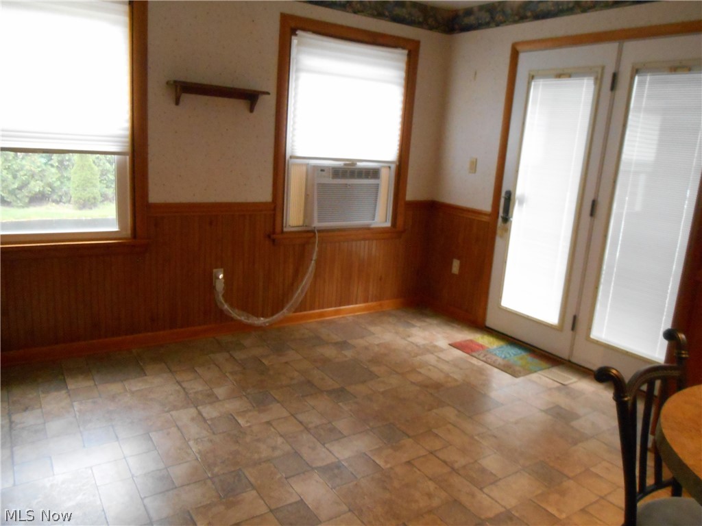 7396 Poore Road Conneaut, OH 44030 - Photo 18 of 35 DINING AREA WITH DOOR TO DECK