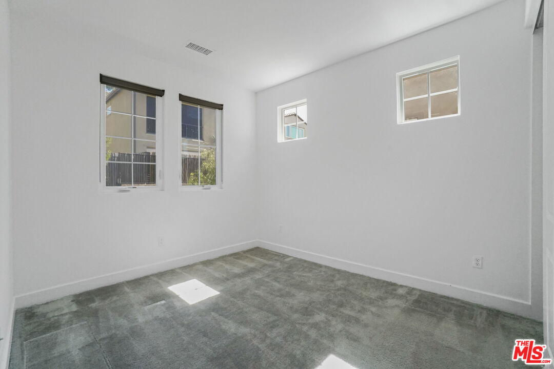 20705 West Chestnut Circle Porter Ranch, CA 91326 - Photo 17 of 35 a view of an empty room with a window